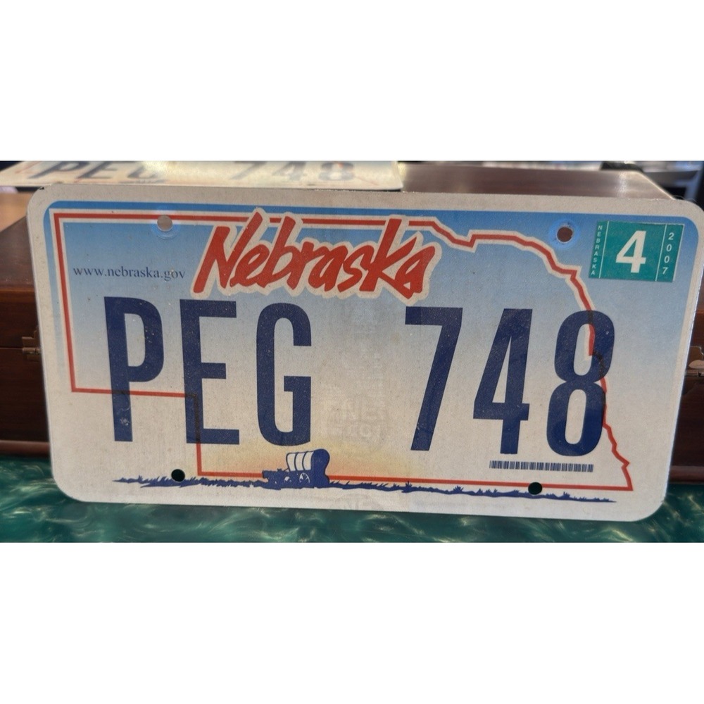 Nebraska License Plate Pair Set of 2 PEG 748 State Outline Design Used